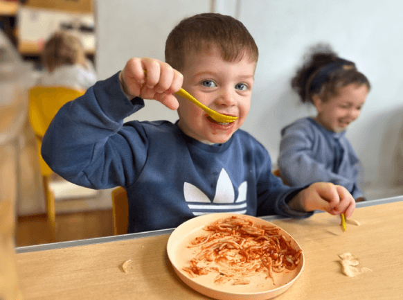 motivated and enthusiastic learners boy eating food